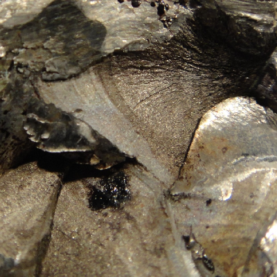 Macroscopic aspect of the 1" shaft fracture surface, revealing beach marks at the surface typical of fatigue, initiated from the surface of the spline shaft at the gear position.