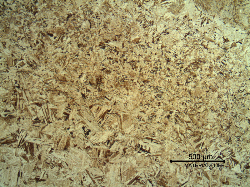 Micrography of the heat-affected zone. The fusion line is in the right and the coarse structure of the base metal is refined at the heat affected zone.