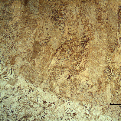 Micrography of the weld metal close to the fusion line showing the previous austenite columnar grain boundaries.