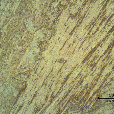 Micrographic detail of the tempered martesite weld metal close to the fusion line. The columnar grains can be observed .
