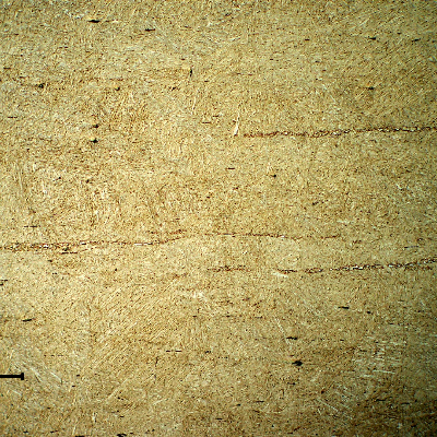 Micrography of a longitudinal section of the pin, presenting a tempered martensitic structure with aligned delta ferrite and carbide phases.