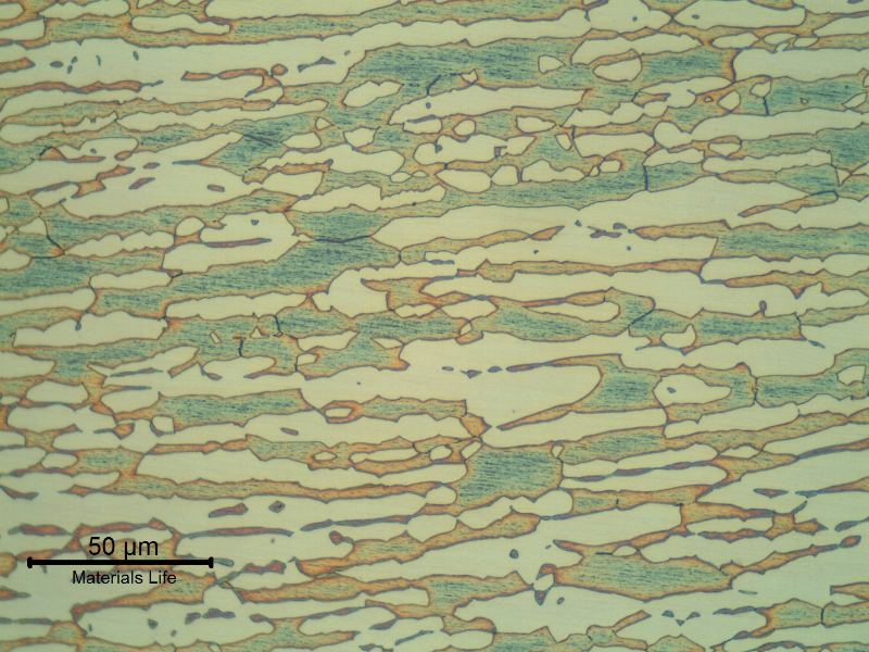 Micrographic detail of the pipe base metal presenting a refined duplex ferritic austenitc structure, banded.