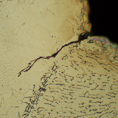 Micrographic detail of the fatigue cracking at the margin of the flange to shell fillet weld.