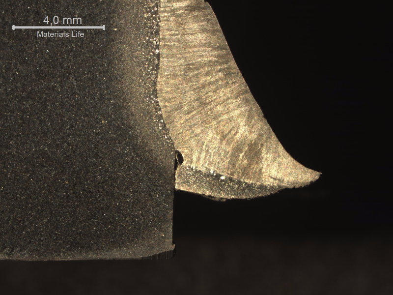 Macrography showing the different regions of a pipe-to-plate fillet weld. See the schematic drawing in the next image