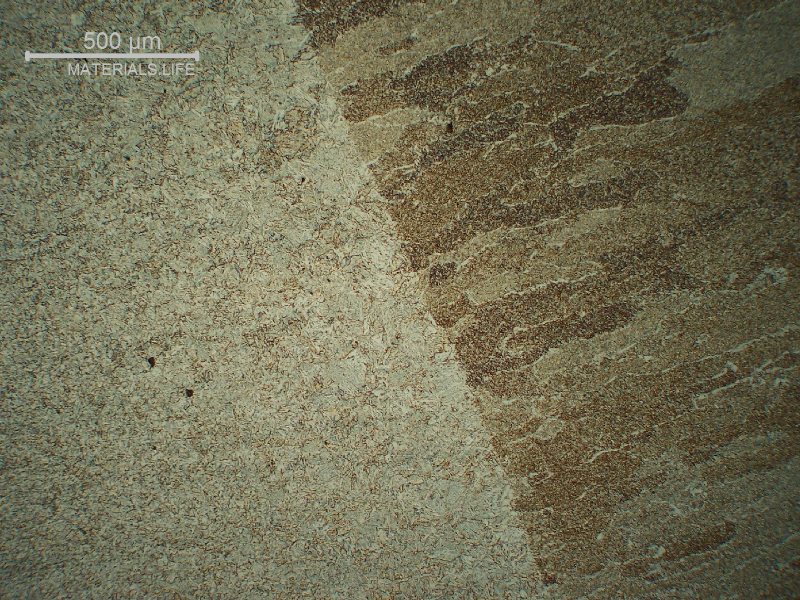 Micrography of the fusion line of the second pass (not reheated).  The HAZ is bainitic and the weld metal presents columnar grains (of the previous austenite).