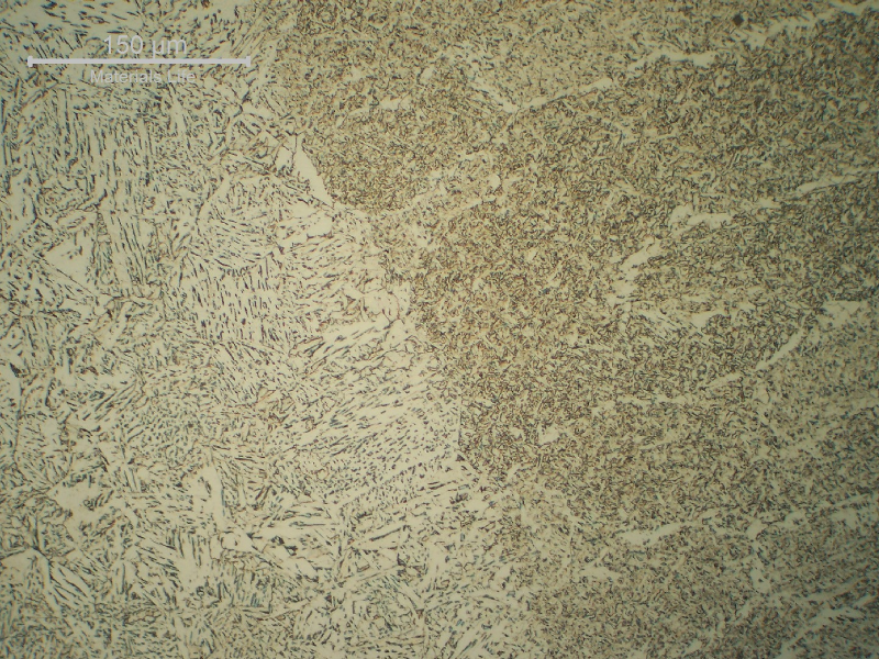 Micrographic detail of the fusion line of the second pass (not reheated). The HAZ is bainitic and the weld metal microstructure is predominantly formed by acicular ferrite.