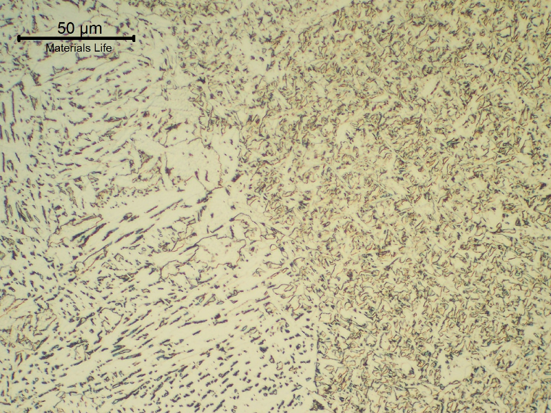 Micrographic detail of the fusion line of the second pass (not reheated). Bainitic HAZ and acicular ferrite in the weld metal.