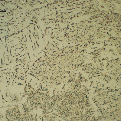 Micrographic detail of the fusion line of the first pass (reheated in high temperature). The HAZ is bainitic and the weld metal microstructure is predominantly formed by acicular ferrite.