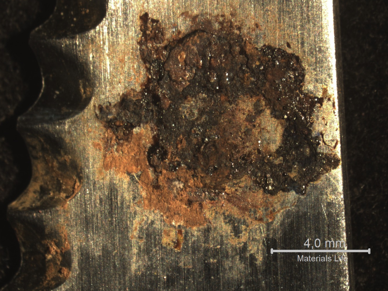 Detail of the rusted surface of the knife, before cleaning.