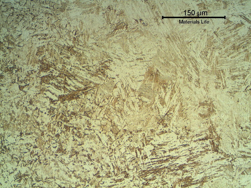 Micrographic detail of the fusion line of the inserted casting welded to the original casting.  There is a refinement effect on the coarse base metal structure.