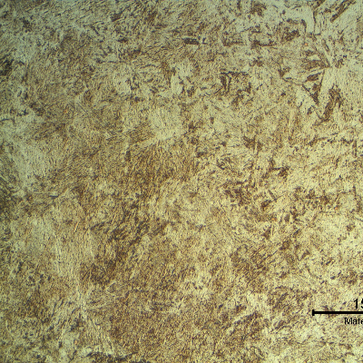 Micrographic detail of the fusion line of the original casting blade welded to the insert casting.  There is a refinement effect on the coarse base metal structure.