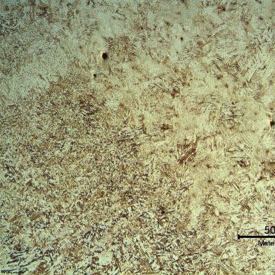 Micrography of the inserted casting at the heat affected zone of the welding with the original casting.  There is a refinement effect on the coarse base metal structure.