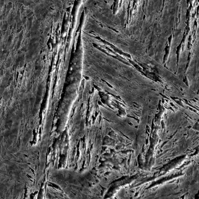 Higher magnification of the martensitic structure of the inserted casting structure, hardness level of  370HV10.