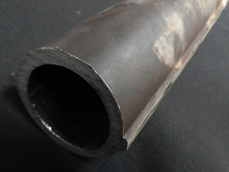 The 2 1/2" nominal diameter seamless tube is externally cladded with stainless steel.