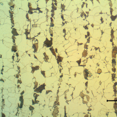 Micrography of a longitudinal section of the pipe showing the carbon steel pipe , internal.