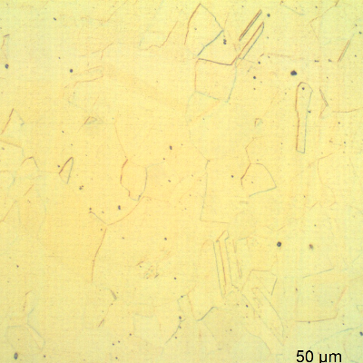 Micrography of a longitudinal section of the pipe showing the stainless steel pipe , external.