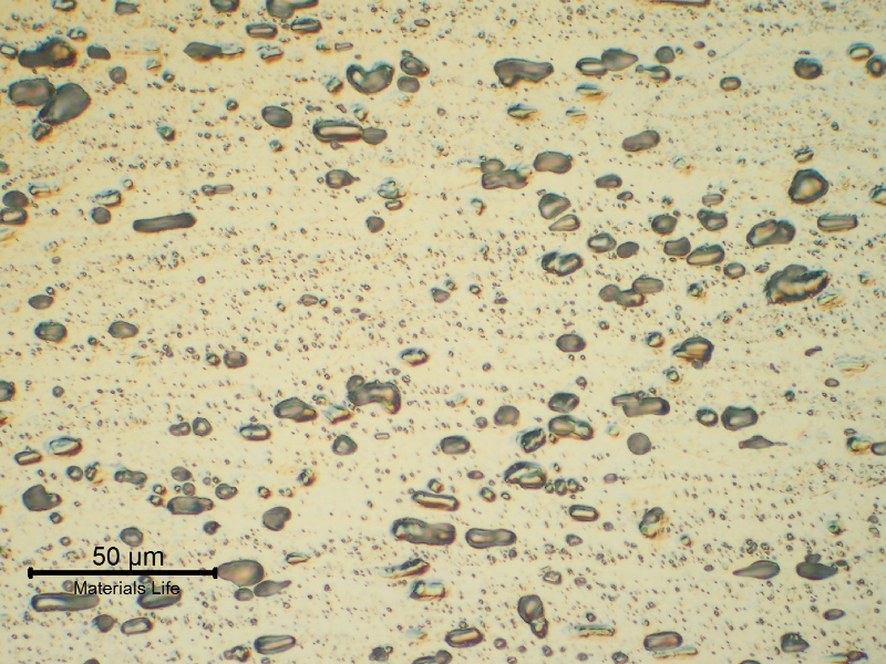 Micrographic detail of a longitudinal section of the pipe AA 3003. Granular structure and dispersed particles.
