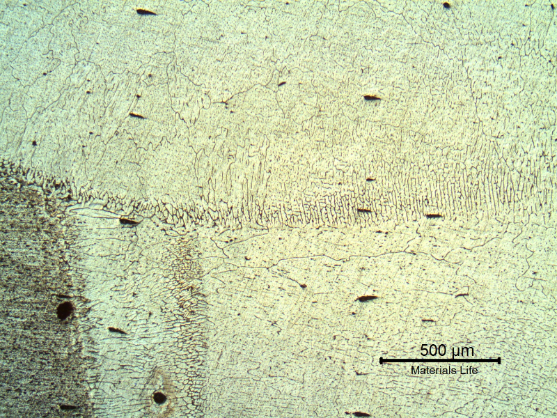 Micrography of the weld metal structure. At the interface between the two passes, close to the AA 3003 pipe.