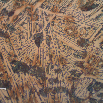 Micrographic detail of the chilled structure. Primary carbides, ledeburite and perlite islands.
