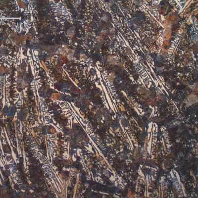 In the intermediary position of the shaft thickness (T/4) the amount of perlite increases in the matrix and primary carbides decreases compared to the chilled surface.