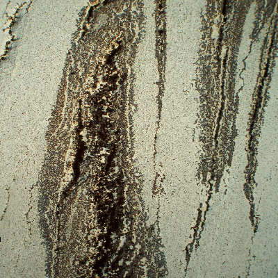 Micrography of a transverse section of the seam weld, in the middle of the thickness, presenting several parallel cracks.
