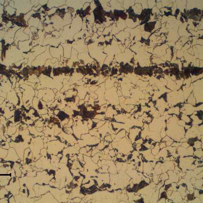 Micrography of a longitudinal section of the 1" plate, in the center of the thickness, presenting a refined ferritic perlitic microstructure. Banded.