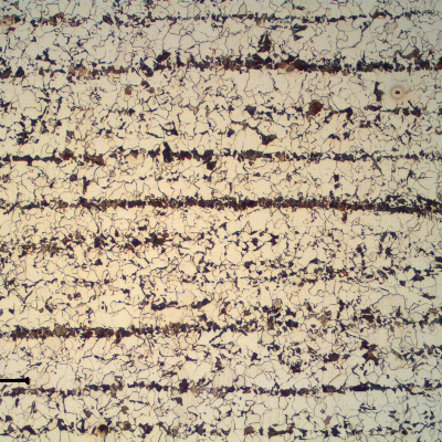 Micrography of a longitudinal section of the 1" plate, in the center of the thickness, presenting a refined ferritic perlitic microstructure. Banded.
