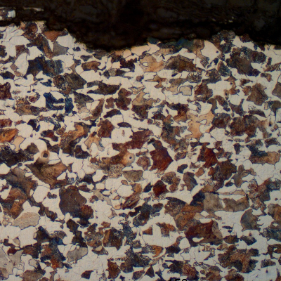 Micrographic detail of the ferritic-perlitic structure at the surface where the wear damage is light.