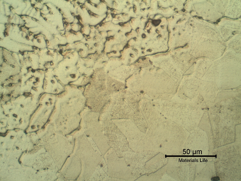 Micrographic detail of the elbow fusion line.