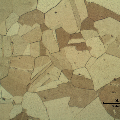 Micrographic detail of the pipe base metal presenting a granular microstructure. Some inclusions are also visible.