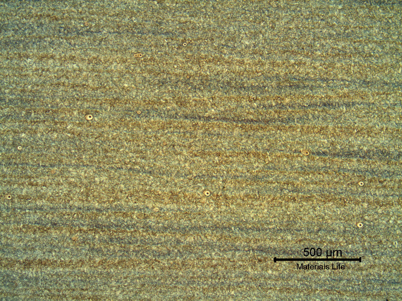 Micrography of the base metal presenting a banded microstructure in the longitudinal section of the pipe.