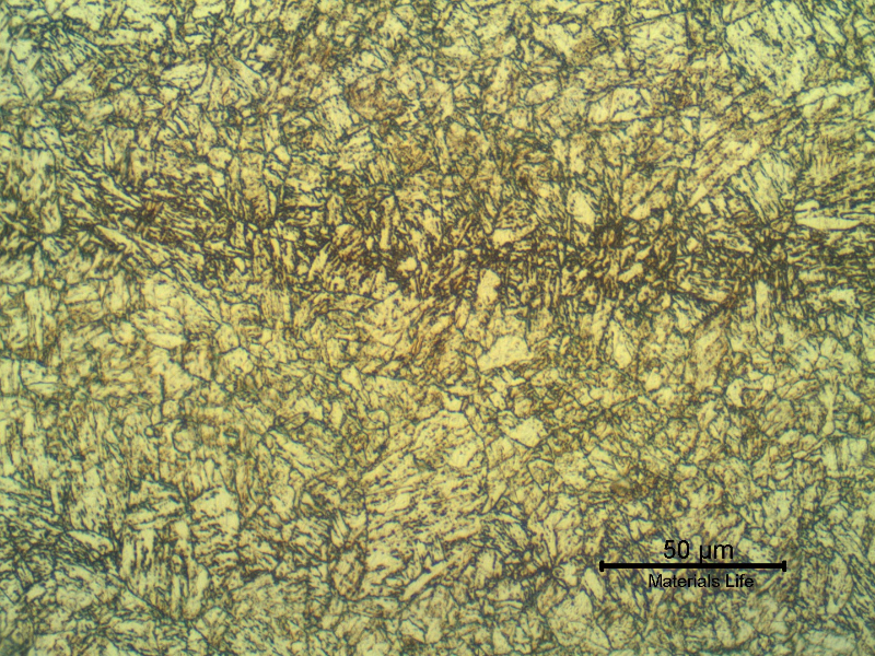 Micrographic detail of a longitudinal section of the base metal presenting a quenched and tempered microstructure.