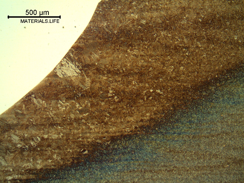 Micrography of the fusion line close to the cap pass (CP).  The weld metal (non etched) is in the left side.