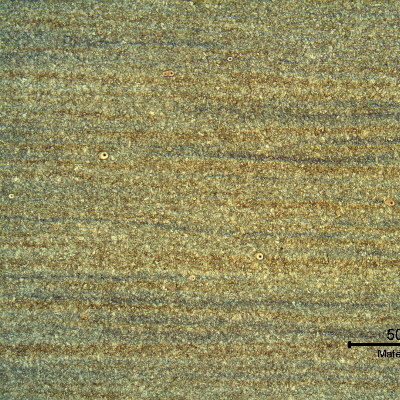 Micrography of the base metal presenting a banded microstructure in the longitudinal section of the pipe.
