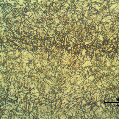 Micrographic detail of a longitudinal section of the base metal presenting a quenched and tempered microstructure.