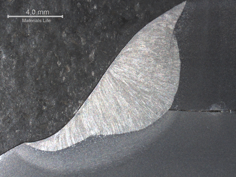 Macrography of the welded joint in a non cracked region.