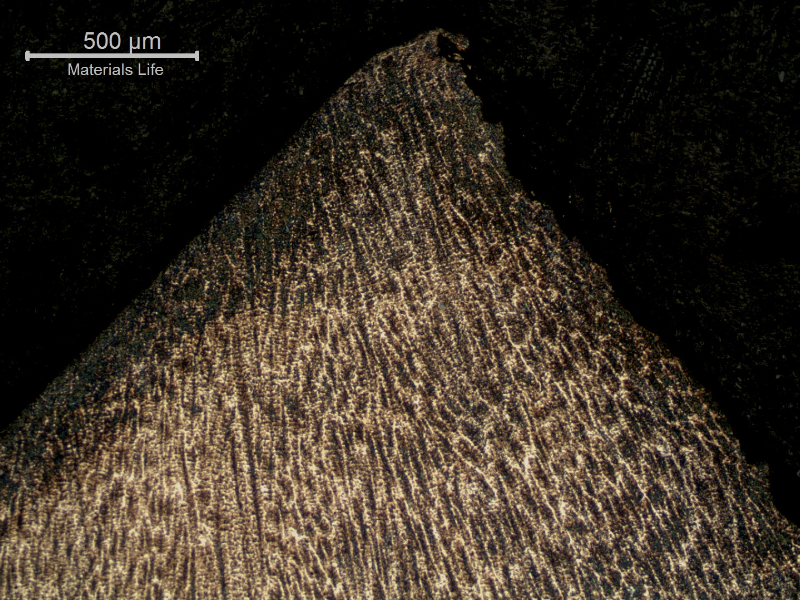 Micrography of the fractured region in the center of the fillet weld metal, that is hard due to the increase in the Mn and Si contents.