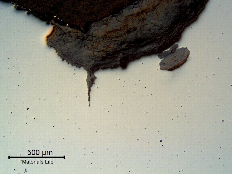 The micrography in the as polished condition of the longitudinal section of the pipe close to the washout, shows that at the tool mark tip (notch from the external surface) a fatigue crack already started from a corroded region (pitting).