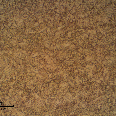 The microstructure of the pipe, presented in a longitudinal section, is an uniform tempered martensite.