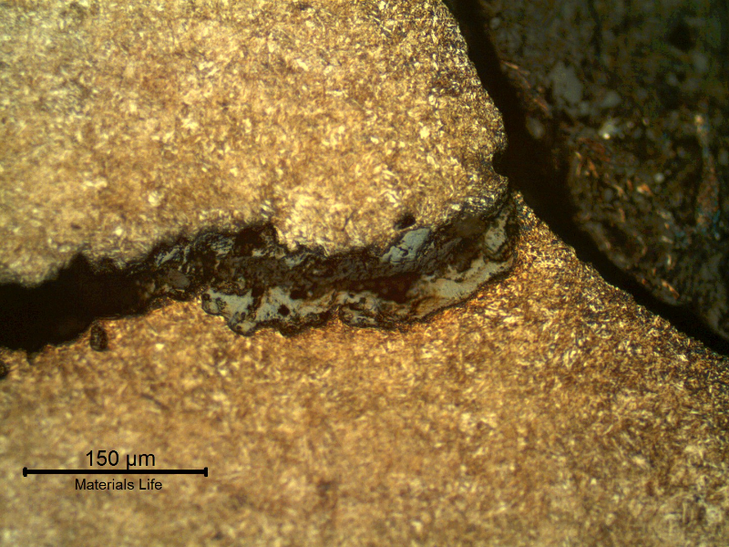 Micrography of the secondary crack, in the fillet adjacent to the nut position, where it was opened to the surface.