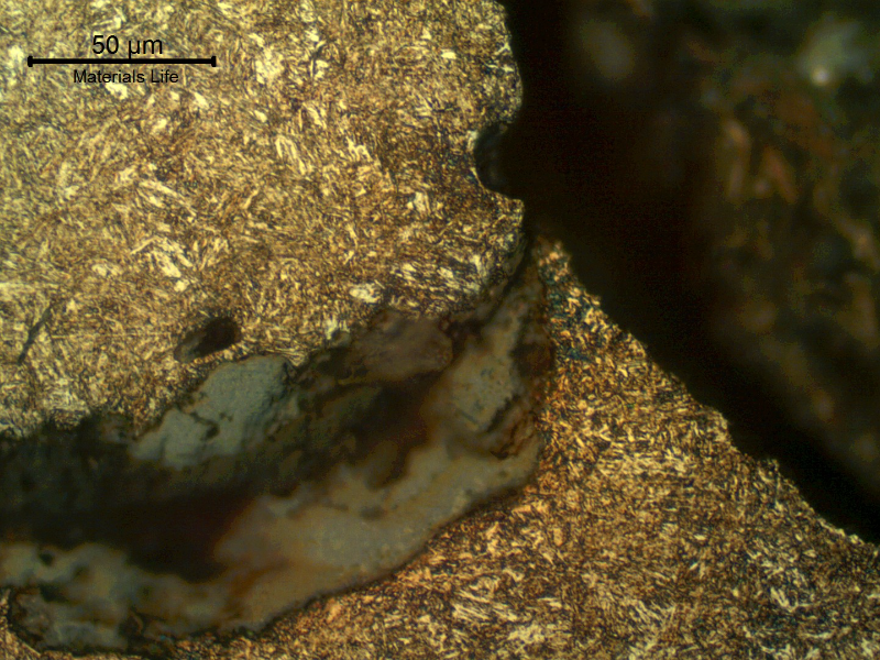 Micrographic detail of the secondary crack, in the fillet adjacent to the nut position, where it was opened to the surface.