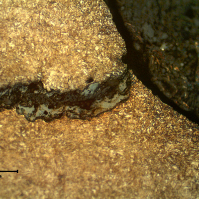 Micrography of the secondary crack, in the fillet adjacent to the nut position, where it was opened to the surface.