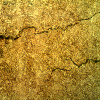 Micrographic detail of the intergranular morphology of the internal hydrogen cracks.