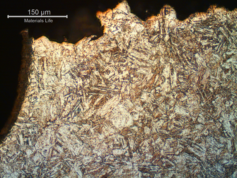Micrography of the longitudinal section of the bolt, at the bottom of the thread fillet, showing that the fracture is intergranular in this position.