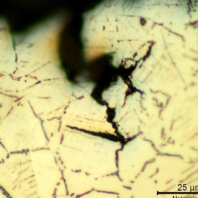 Micrographic detail of the longitudinal section of the stud, at the secondary cracking.