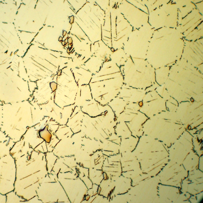 The stud structure evidences grain boundaries precipitation of probably delta phase (an overaging of the hardening precipitate).