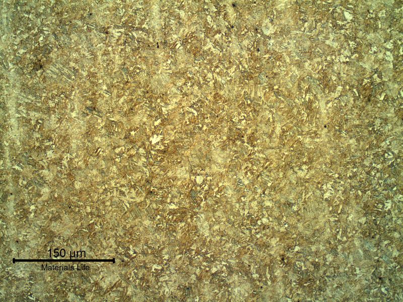 Micrography of a longitudinal section of the link, presenting a tempered martensitic structure, typical of a quenching and tempering heat treatment and compatible with the link hardness of 43 HRc.