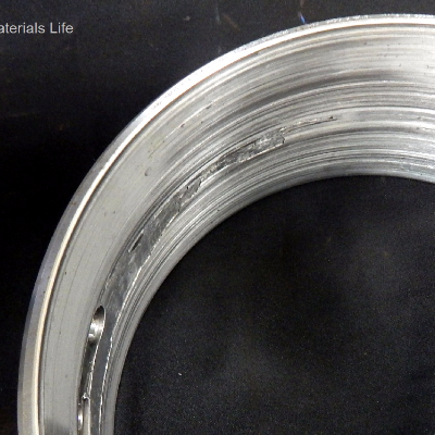 Bimetallic engine bearing, removed from service at the end of its life.