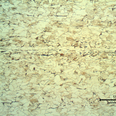Micrography of a transverse section of the back steel of an engine bearing, presenting a predominantly ferritic structure, strain hardened.