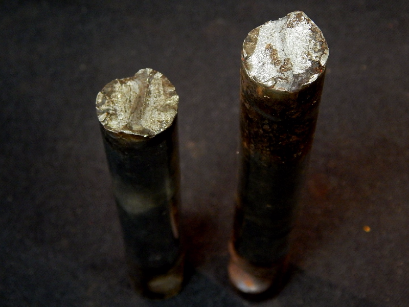 Aspect of the 5/8" diameter pin, that was 3" long and broke close to the center.